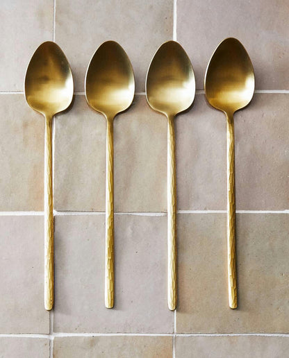 BOX OF 4 SPOONS WITH HAMMERED HANDLE