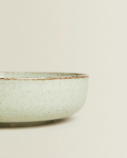 PORCELAIN BOWL WITH ANTIQUE FINISH RIM
