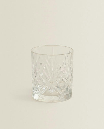 CRYSTALLINE TUMBLER WITH RAISED DESIGN