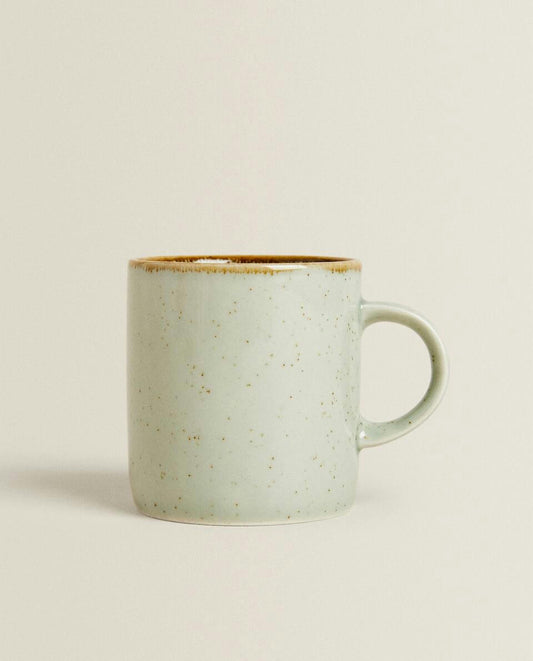 PORCELAIN MUG WITH ANTIQUE FINISH RIM