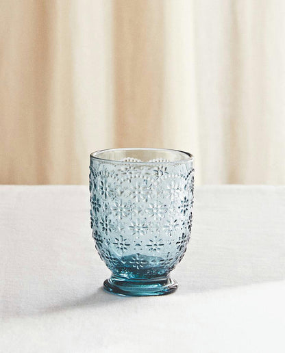RAISED FLORAL DESIGN GLASS TUMBLER
