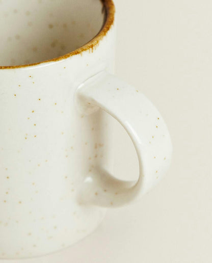 PORCELAIN MUG WITH ANTIQUE FINISH RIM